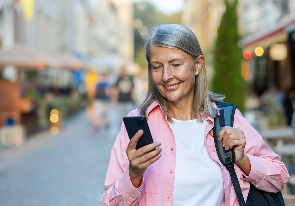 Woman in street with phone